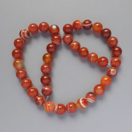 Orange agate beads, smooth round spheres, 10mm diameter, 39 cm length on thread
