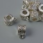 Bail for jewelry, diameter 7×9.5 mm, hole 4.5 mm, packaging 9 pcs, 20 g