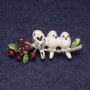 Birds on a Branch Brooch in white and brown enamel, silver-tone metal 21×55 mm