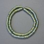 Hematite rondelle beads in chameleon green color, diameter 6x1mm, length 42cm strand
