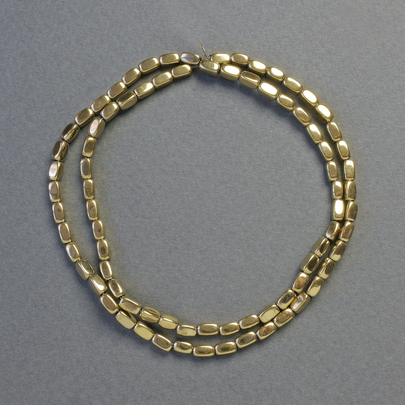 Hematite beads, oval-rectangular shape, gold color, 3x5 mm diameter, 41 cm length, strand
