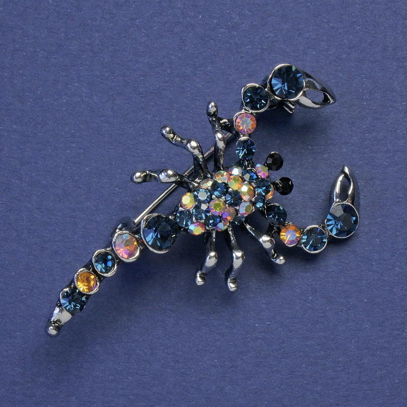 Brooch 'Scorpion' blue and petrol crystals, silver-tone metal, 47×25 mm +