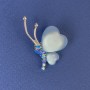 Brooch 'Butterfly', diameter 34×21 mm ± blue Cat's Eye crystals, silvery metal
