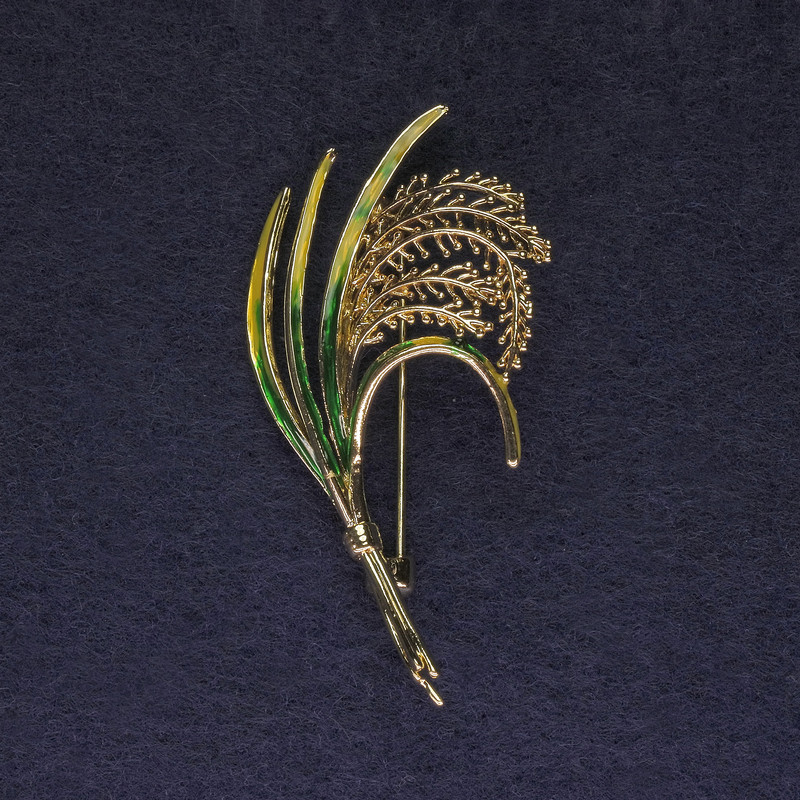 Brooch Twig green and yellow enamel on gold-toned metal, diameter 52 x 27 mm +