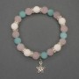 Bracelet Assorti, smooth bead, 8mm diameter +/- with metal inserts, length 18mm +/- stretch