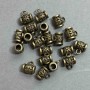 Bronze-colored bail hardware, dimensions 9x7x10 mm ±, hole diameters 4 mm and 2–3 mm ±, packaging 20 g (~21 pcs)