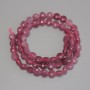 Faceted coin-shaped tourmaline beads, 6.5 mm diameter, 38 cm length on thread