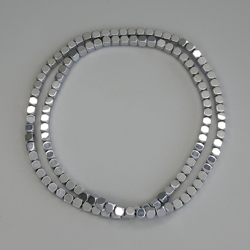 Hematite beads, silver color, faceted 4x4 mm ± on thread, length 40 cm+