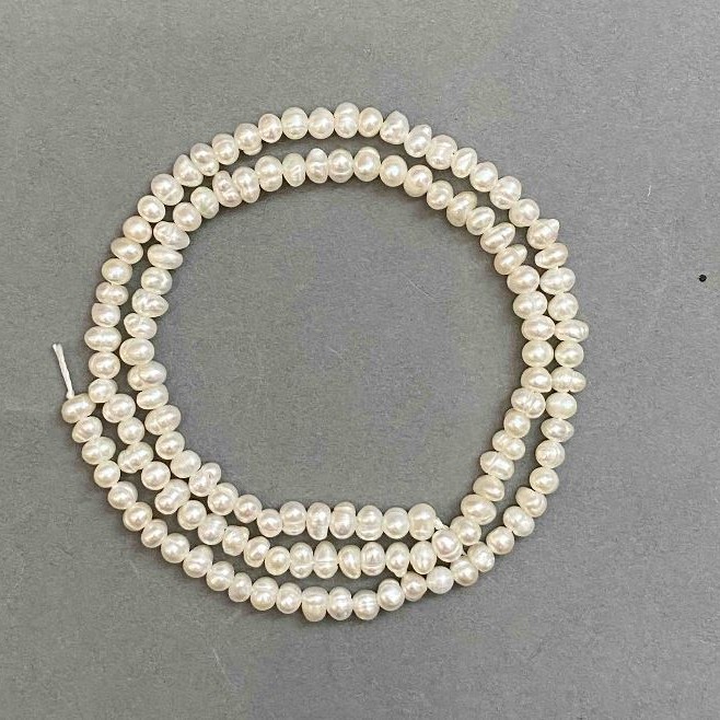 Natural freshwater pearl beads 3x4 mm, length 35 cm on a thread