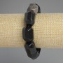 Bracelet with natural obsidian, silver-toned faceted stones, diameter 20 × 15–16 mm, length 18 cm