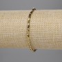 Golden Czech crystal bracelet with faceted cylinders 5×3 mm and 2 mm beads, stretch length 18 cm
