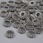 Bead insert, silver metal color, 7×3 mm with hole, diameter 2.8 mm, packaging 20 g (~41 pcs)