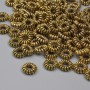 Gold-tone bead insert — 6×2 mm with 2 mm hole; packaging 20 g (~94 pcs)