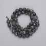 Larvikite beads, faceted, 8×7 mm diameter, on a thread, 37 cm long