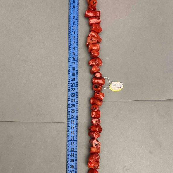 Faceted natural coral beads - assorted sizes, diameters from 12x10 to 30x12 mm, approx. 225 g, length 39 cm ± on a beading thread