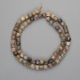 Rhodonite beads, faceted cubes 5x5 mm, length approx. 39 cm, on thread
