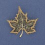 Brooch 'Wedge Leaf' with brown crystals, bronze color, and gold-toned metal, 45x44mm+