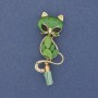 Brooch-pendant 'Cat with a Bone', green cat's-eye on golden metal 43x17 mm+