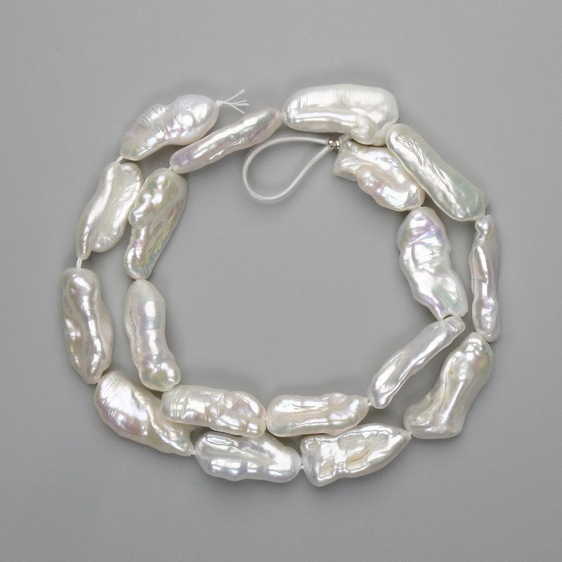Baroque pearls on a strand with petrol shade, 20–26×9–12 mm, length 41 cm+