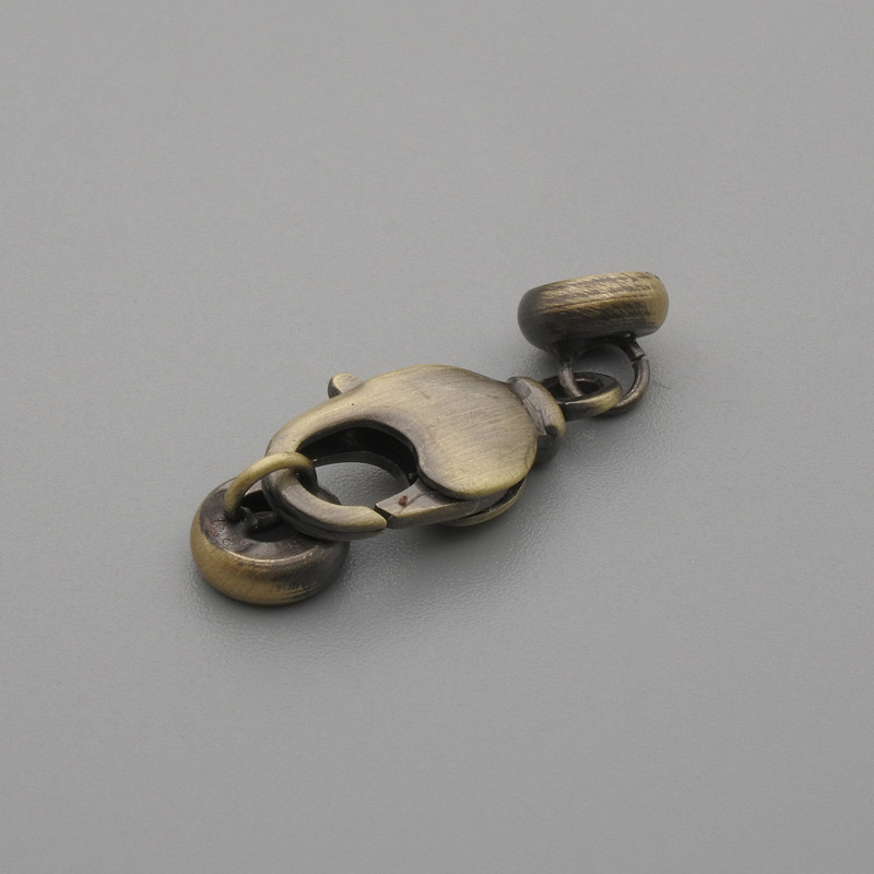 Price per 1 pc. Bronze-colored lobster clasp, 17×7 mm ±, 6 mm diameter ±