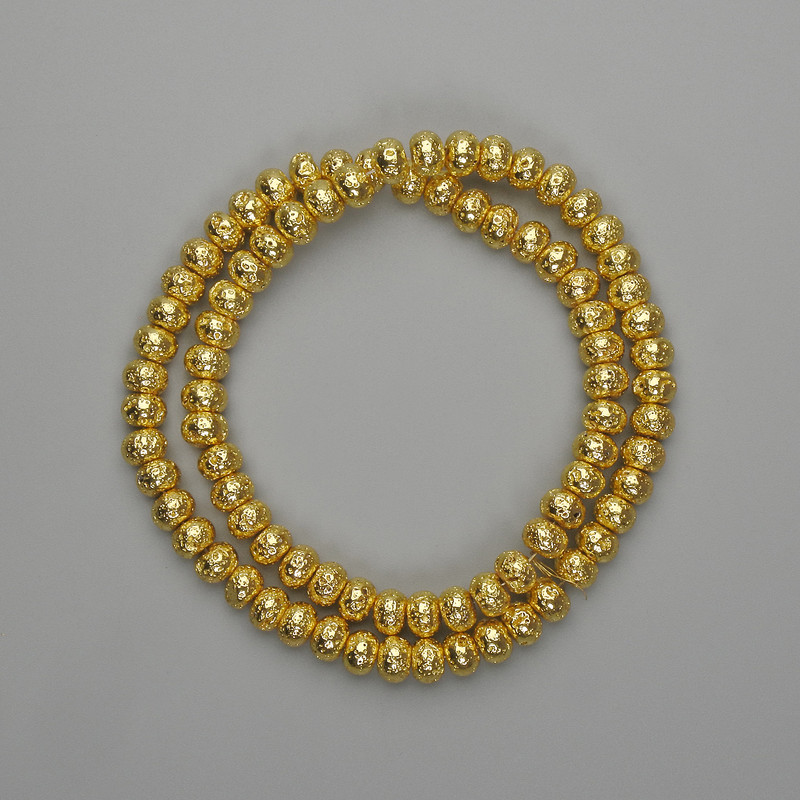 Lava beads with golden metallic finish, porous rondel 6x4.5 mm, 38 cm length +/-