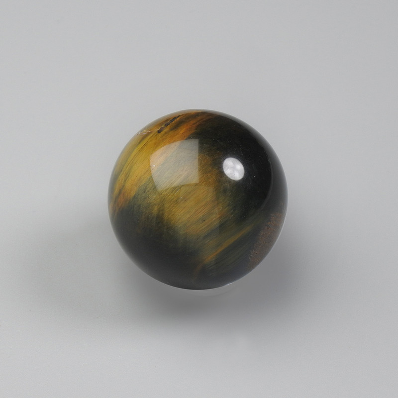 Decorative sphere of natural Tiger's Eye and Hawk's Eye, diameter 30-40 mm ±, assorted sizes, weight from 35 g. (Price per 100 g)