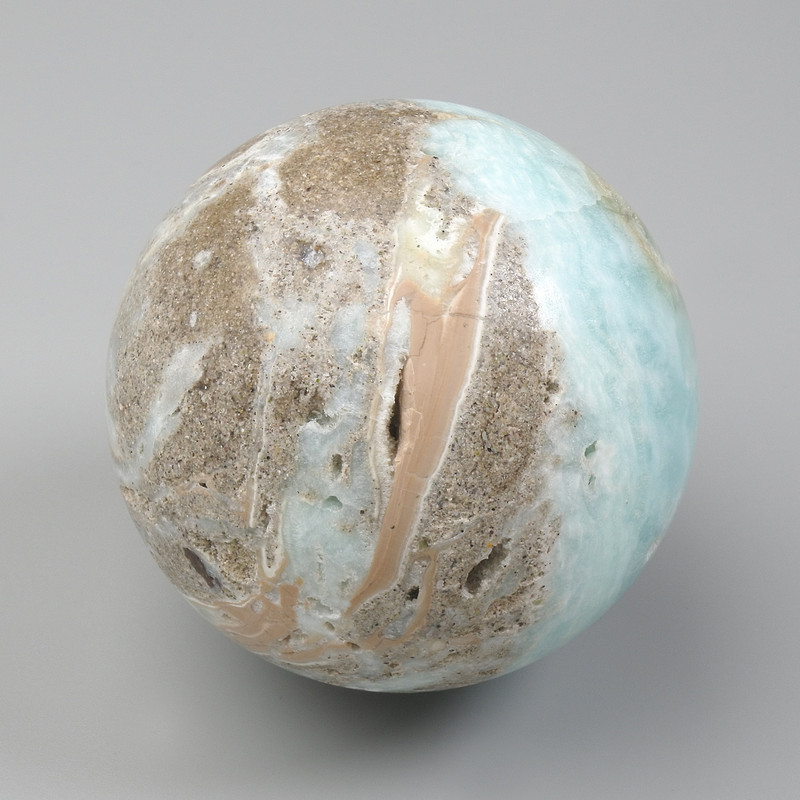 Larimar natural stone souvenir sphere, diameter 50-65 mm ± assorted sizes, weight from 165 g. (price per 100 g)