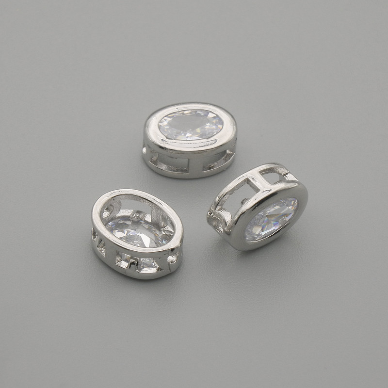 Bead insert, oval white crystal, silver-tone setting, 9×7 mm, hole diameter 1.3 mm, per piece