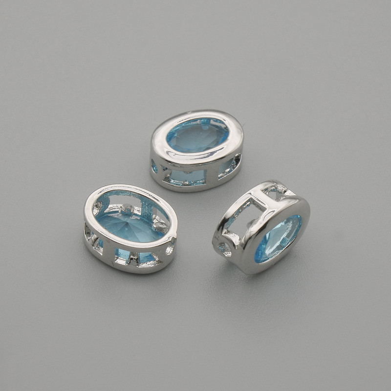 Bead insert with blue crystal, silver-tone metal, oval, 9x7 mm, hole diameter 1.3 mm, per piece
