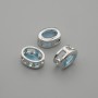 Bead insert with blue crystal, silver-tone metal, oval, 9x7 mm, hole diameter 1.3 mm, per piece