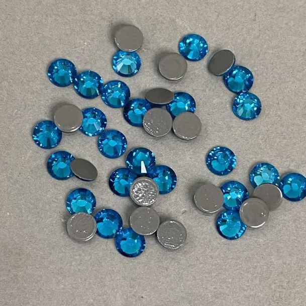 Blue rhinestones, cold-fixation, 6 mm diameter ±, pack 335 g