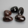 Garnet tumbled souvenir stone 23-30×15-21 mm ± packaged 100 g (Price per 100 g)