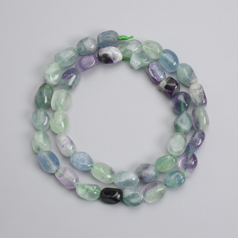 Fluorite faceted beads 9-11×7-8 mm, length 39 cm +/- on thread