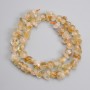 Citrine beads, tumbled, 8-14×4-10.5 mm, 39 cm long on thread