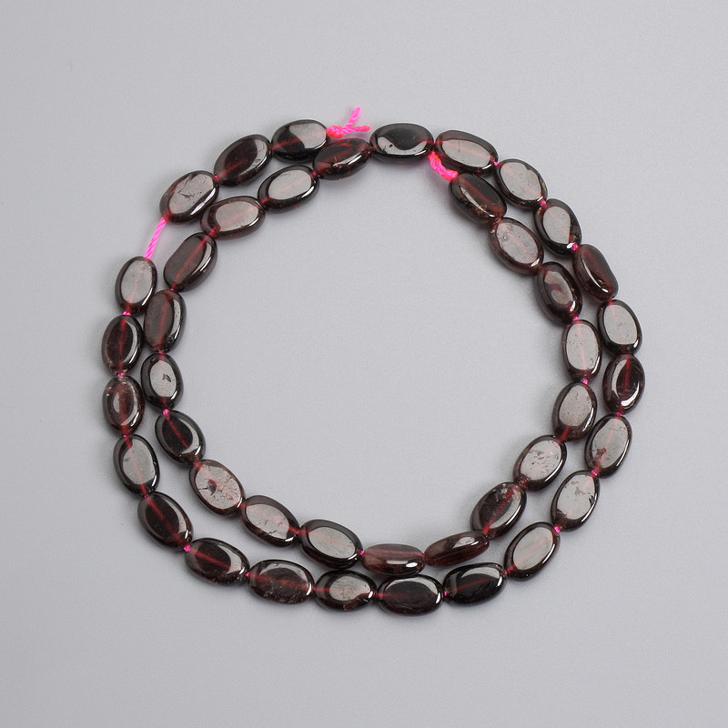 Garnet faceted oval beads 8-10×6-7 mm, on thread, length about 39 cm