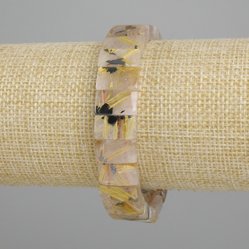 Bracelet of natural rutile quartz (Hair Quartz) smooth links, diameter 12x7-8 mm, length approx. 18 cm, stretch
