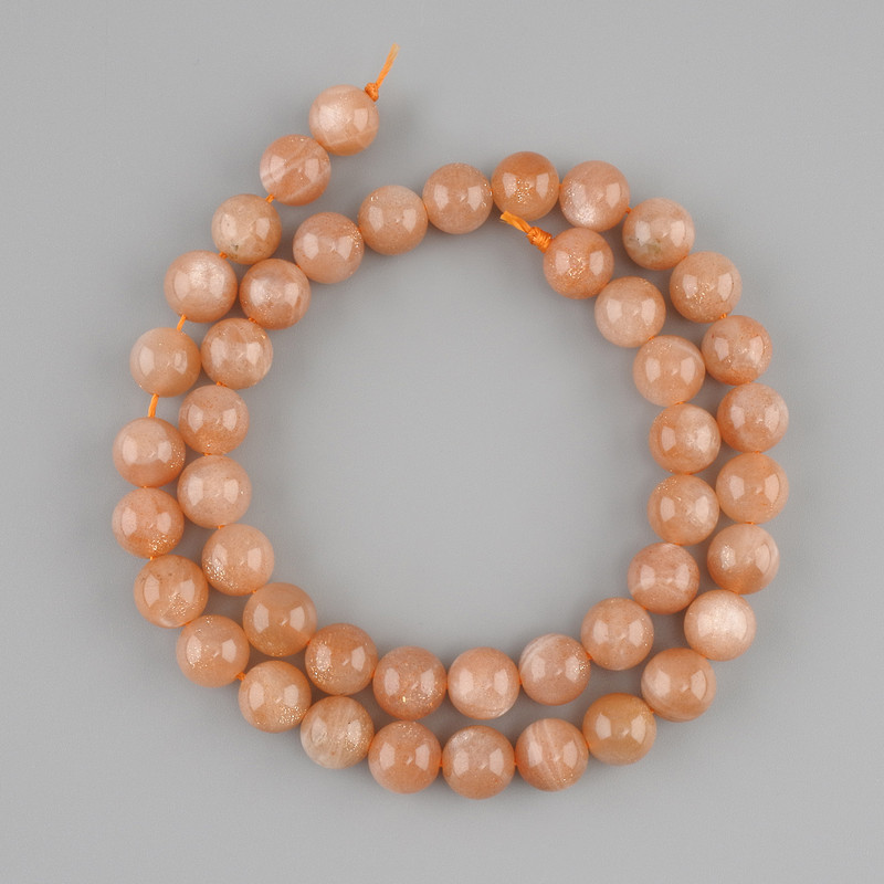 Beads of Sunstone and Selenite, smooth spheres, 8 mm diameter, 39 cm length ± on thread