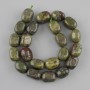 Dragon Blood Jasper beads, tumbled, 16–18 mm diameter, 5×12, 5–13 mm ±, length 36 cm ± on thread