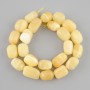 Yellow agate beads, tumbled, diameter 14–18×10–14 mm, length 38 cm ±, on a thread