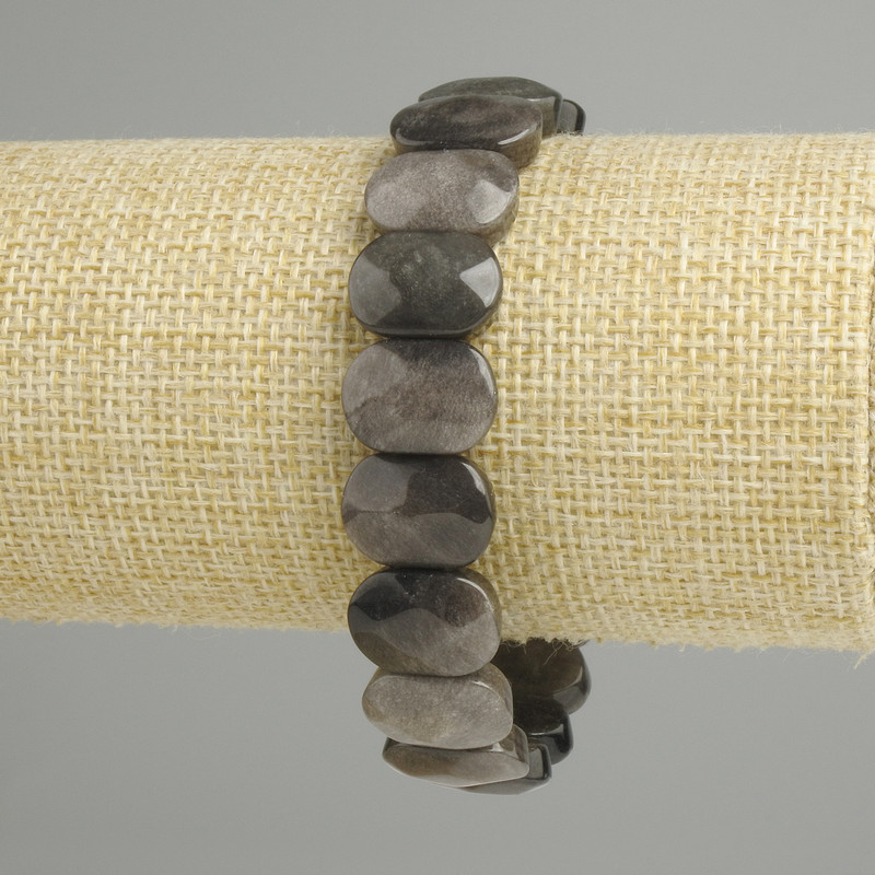 Bracelet with silvery obsidian, rounded faceted links, diameter 15×10 mm, 5–11 mm ±, 18 cm length, stretch