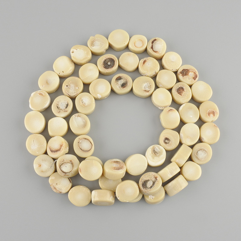 Faceted Coral Beads, diameter 12–12.5 mm, height 13–14 mm, length approx. 78 cm on beading thread
