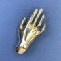 Brooch-pendant 'Hand' in gold-tone metal 27×55 mm+