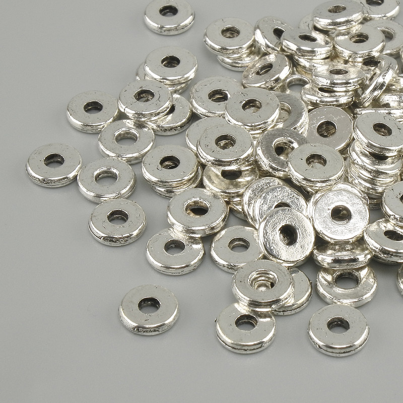 Silver-toned bead insert, 6 mm diameter, hole 2.5 mm ±, packaging 20 g (~100 pcs)