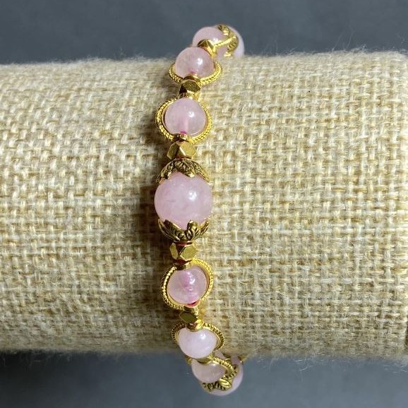 Bracelet Rose Quartz smooth beads, diameter 6–8 mm ±, with metal inserts, length 18 cm ±, stretch