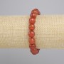 Carnelian Bracelet faceted bead, diameter 10mm+-, length 18cm+- stretch