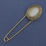 Brooch pin with Cat's Eye stone in gold-tone metal, 80×22 mm+