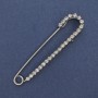 Silver-toned brooch pin with white rhinestones 72×16 mm