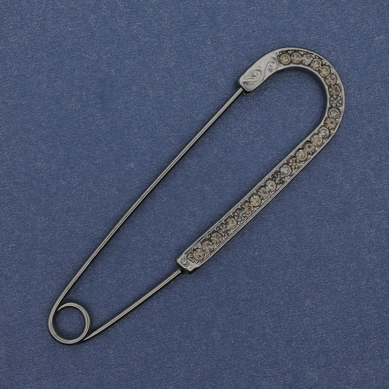 Brooch pin with gray rhinestones 68×19 mm ± dark-silver metal