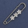 Brooch pin with white crystals 48x10 mm ± silver-tone metal
