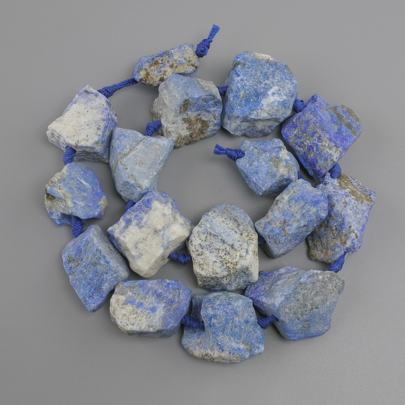 Unprocessed lapis lazuli beads, diameter 23–33×18–34 mm ±, on a thread, length about 41 cm+